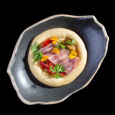 Coca escaldà en Arrels