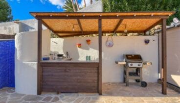 Cocina exterior con barbacoa