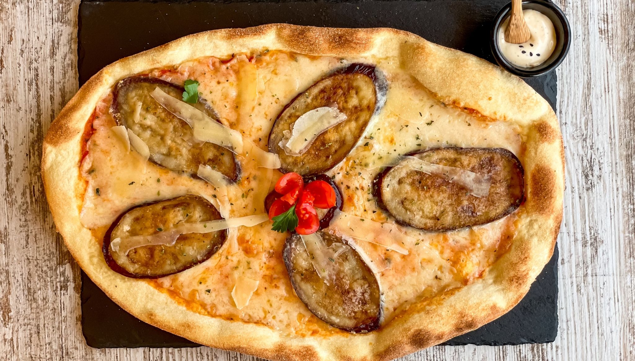 Deliciosas pizzas en Manduc Restaurante-Cafetería