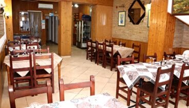 Salón de estilo rústico en La Flor de Eli