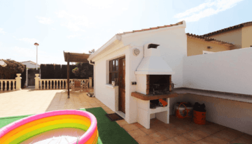 Zona de barbacoa en el exterior de la vivienda