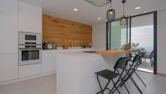 cocina americana equipada con todas las necesidades que buscas en tus vacaciones