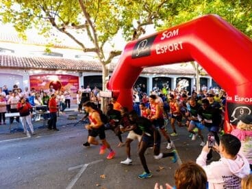 Corredores en la cursa solidaria contra el cáncer Ondara 2025