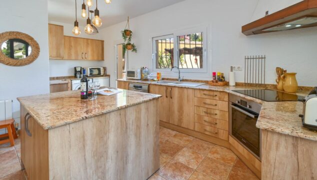 cocina abierta integrada en la zona de dia para mayor comodidad