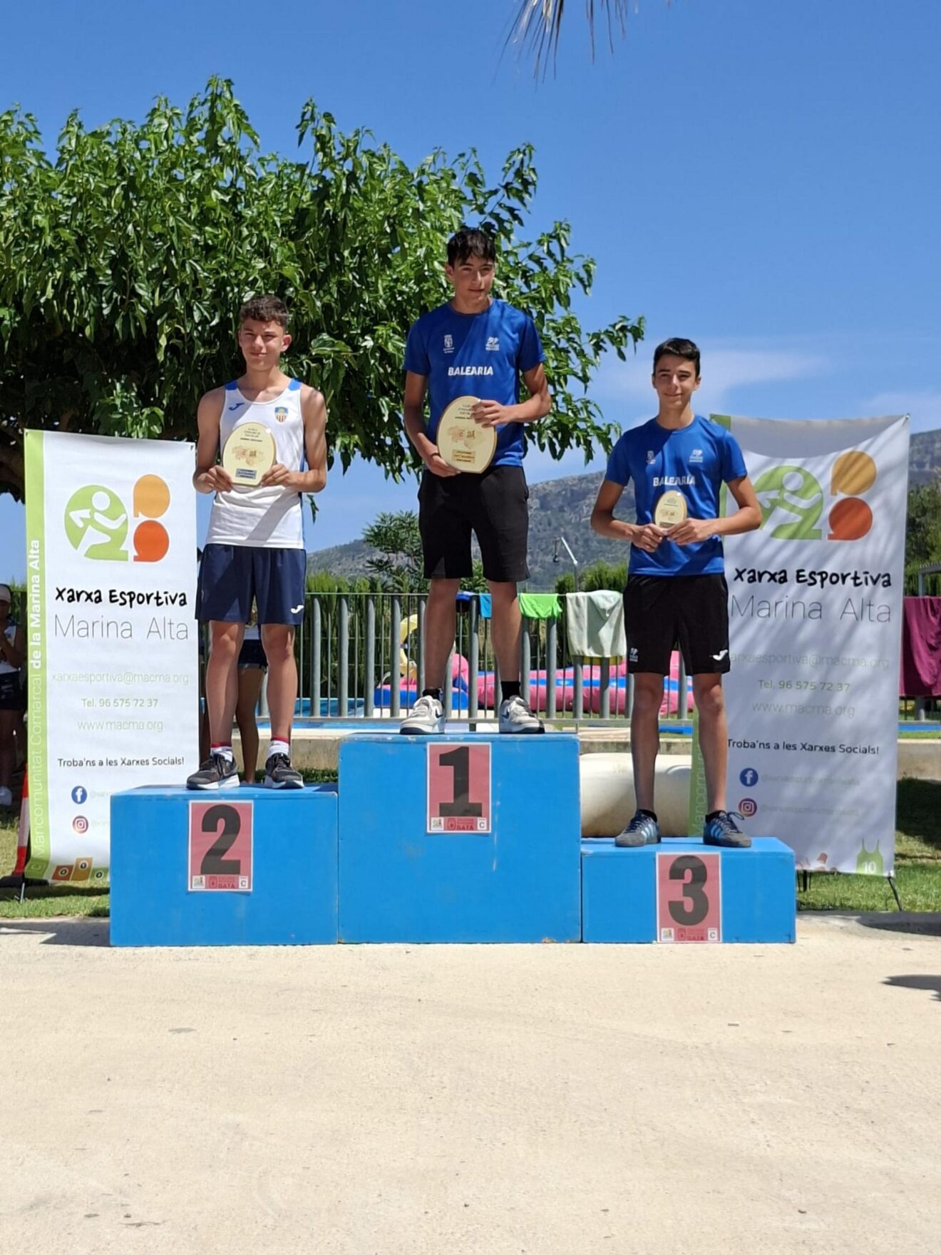 Podio de atletismo en la clausura de las ligas escolares de la Marina Alta